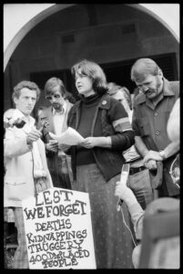 Wendy Bacon speaking at the "burial" of Victoria Street affordable housing, 1976